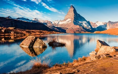 great view of matterhorn/cervino peak. stunning morning view of stellisee lake. beautiful autumn scene of swiss alps, zermatt resort location, switzerland, europe. beauty of nature concept background.