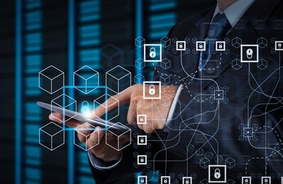 blockchain technology concept with diagram of chain and encrypted blocks.businessman hand using tablet computer and server room background