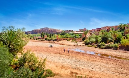 desert landscape with atlas mountains near kasbah ait ben haddou, morocco