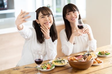 attractive asian women enjoying home party