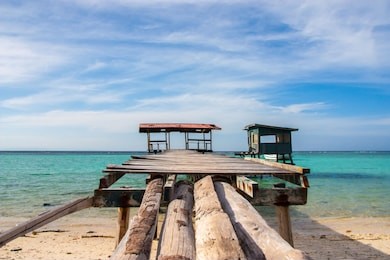 beautiful beach and jetty in mantanani island borneo malaysia