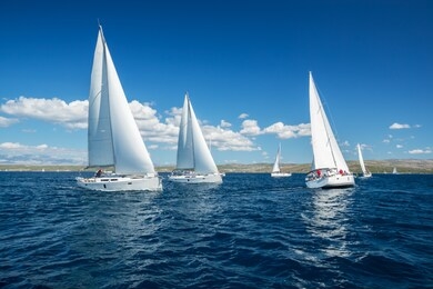 sailing yachts regatta competition. summer sport and recreation activities.