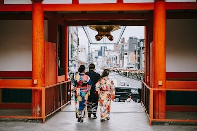 people wearing traditional japanese kimonos near yasaka shrine in kyoto, japan.