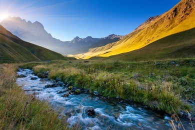 beautiful view of mountain river in summer. juta village - foot of mt chaukhebi. georgia, europe. caucasus mountains. beauty world.