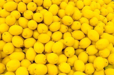 colorful display of lemons in market