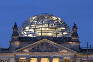 reichstag in capital of germany, berlin. pictures shows the dome top of the building. night shot. it`s now a famous tourist attraktion.