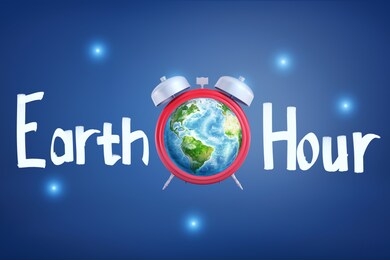 3d rendering of an alarm-clock with planet earth instead of the clock-face with the title 'earth hour'. go green and care about environment. environmental conservation. save energy.