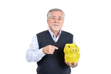 finance elderly man hold piggy savings  money wealth with copy space for your advertisement or promotional text on white background.