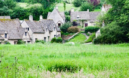 traditional cotswold cottages in england, uk. bibury is a village and civil parish in gloucestershire, england