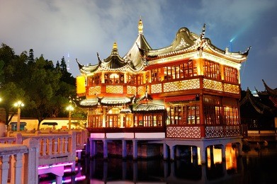 historical pagoda stile building in shanghai at night