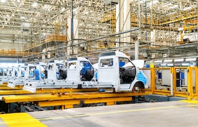 car production line, skilled workers are working tense.