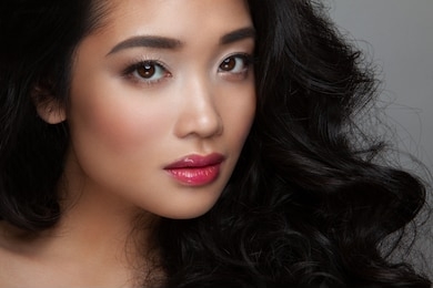 closeup young woman face with clean skin