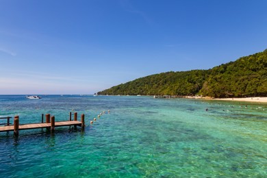 amazing beautiful clear waters at the dock in manukan island at borneo, sabah, malaysia