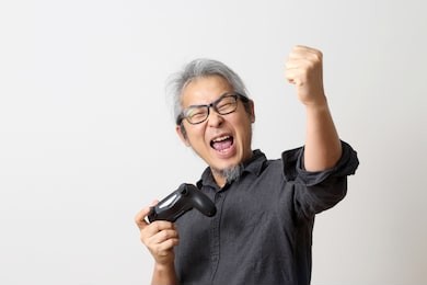 the adult asian man on the white background.