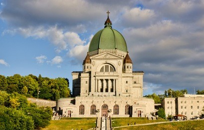 st.joseph oratory and st.joseph monument, at sunset, with cloudy sky