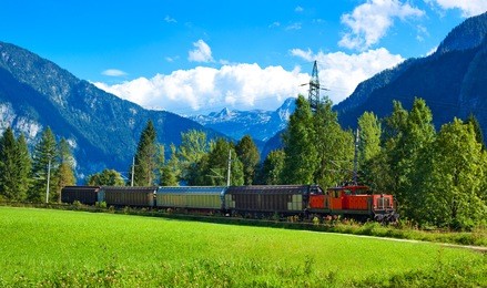 alps mountains landscape with train.