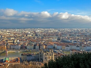 lantern, rooftops and cathedral st. jean baptiste in vieux lyon, the old town of lyon, france. popular european touristic big city in europe and unesco heritage site