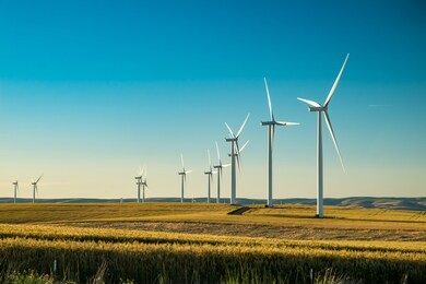 wind electricity generator in summer fields, power plant, wind efficiency