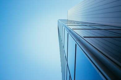 blue skyscraper out of glass, modern office building