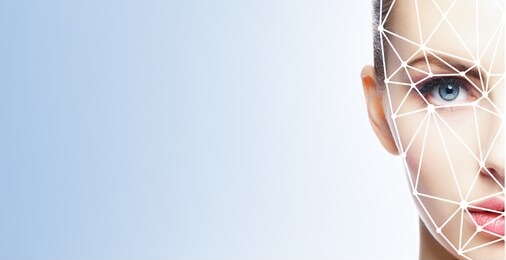 portrait of attractive woman with a scnanning grid on her face. face id, security, facial recognition, future technology.