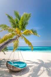 tropical beach background as summer landscape with beach swing or hammock and white sand and calm sea for beach banner. perfect beach scene vacation and summer holiday concept. boost up color process