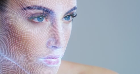 futuristic and technological scanning of the face of a beautiful woman for facial recognition and scanning to ensure personal safety. 