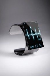 modern internet smart watch on a grey background  --  all texts, icons, computer interfaces where created from scratch by myself.