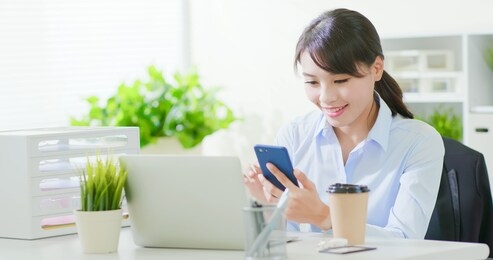 business woman use a smartphone in the office