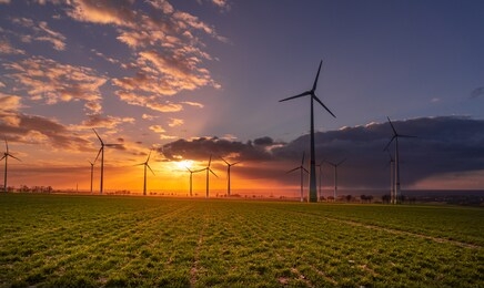sunset with wind turbines
