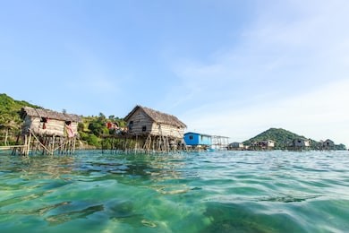 beautiful landscapes view borneo sea gypsy water village in bodgaya mabul island, semporna sabah, malaysia.