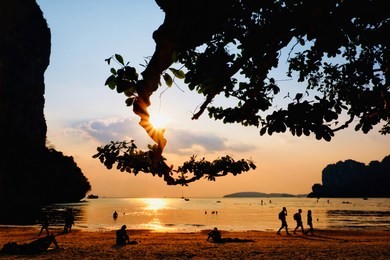 the sun goes down at the railay beach,krabi,thailand.