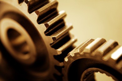closeup of two metal cog gears