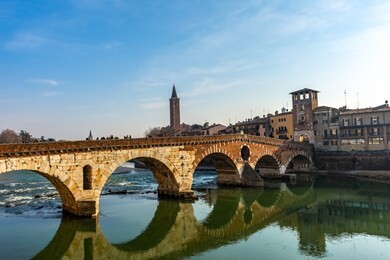 panoramic view of ponte pietra bridge in verona on adige river, veneto region, italy