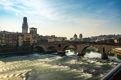 panoramic view of ponte pietra bridge in verona on adige river, veneto region, italy