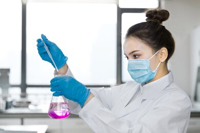 young female scientist working in laboratory