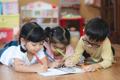 kid asian student doing homework .kid enjoy learning with happiness at home. education concept     