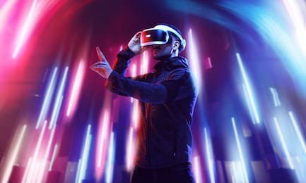 model young man with beard in glasses of virtual reality. augmented reality, science, future technology, people concept. vr. futuristic 3d glasses with virtual projection. neon light.