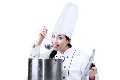 asian chef is tasting a traditional soup isolated on white background