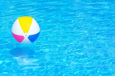 inflatable ball floating in swimming pool