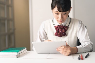 studying asian school girl.