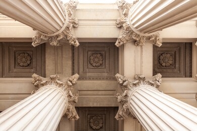 court house or museum pillars or columns looking straight up and symmetrical 