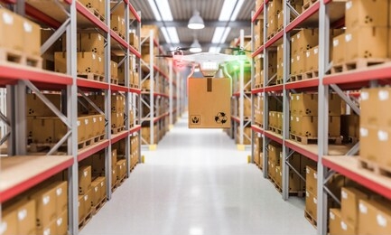 3d rendering image of drones at work in a warehouse full of goods. concept of automated logistics and fast shipping.