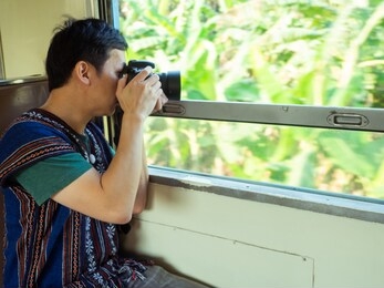 travel concept.happy asian people traveling by train. asia take photo in train