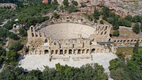aerial drone bird's eye view photo from iconic ancient theater of herodes atticus near acropolis hill, athens historic center, attica, greece
