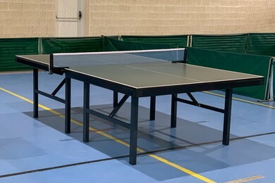 image of green table tennis table closeup