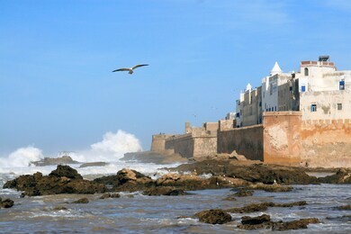 essaouira ramparts aerial panoramic view in essaouira, morocco with big waves. essaouira is a city in the western moroccan region on the atlantic coast.