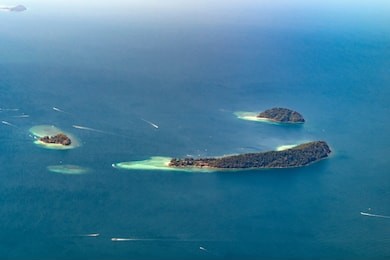 an aerial photos of tunku abdul rahman park consists of manukan, memutik and sapi island located in the state of sabah, malaysia
