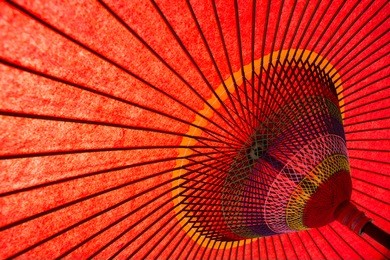 underside of red japanese parasol