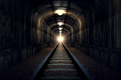 a railroad tunnel with a light at the end. can represent achieving your goals, getting through problems and obstacles or simply represent exactly what you can see - an old tunnel.