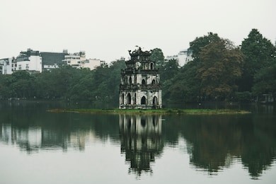 hoan kiem lake, the little lake in old part of hanoi, vietnam, with the turtle tower. turtle tower is the symbol of hanoi,vietnam